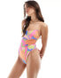 ASOS DESIGN micro strap sleek swimsuit in abstract floral