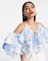 Фото #2 товара ASOS DESIGN ruffle blouse with lace up back in blue floral