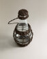 Glass bottle with rattan stopper