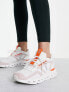 ON Cloudnova Void trainers in white and orange
