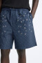 BERMUDA SHORTS WITH METAL EYELETS