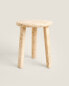 Round travertine mini side table