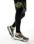 Nike Running Juniper Trial 2 trainers in dark green and white