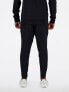 Фото #5 товара New Balance Tech knit pant in black