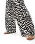 Фото #4 товара JDY Petite pull on wide leg plisse trouser co-ord in black & white zebra print