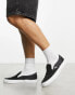 Vans Slip On trainers in black linen