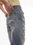 Topshop mid rise straight Dad jeans with extreme rip & repair in mid blue