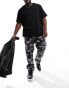 ASOS DESIGN straight fit chino trouser in camo print