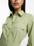 ASOS DESIGN utility mini shirt dress with nipped in waist and pocket detail in khaki