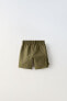 Nylon bermuda shorts with pocket
