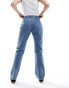 Фото #4 товара ASOS DESIGN mid rise straight jeans in mid blue