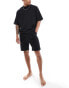 ASOS DESIGN pyjama set with oversized t-shirt and shorts in jersey in black