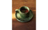 Green stoneware coffee cup and saucer