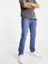 Фото #1 товара Levi's 511 slim fit jeans in mid blue wash