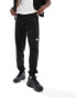 The North Face NSE joggers in black