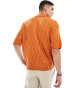 ASOS DESIGN oversized knitted pointelle polo in burnt orange