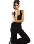 ASOS DESIGN ribbed racer black jumpsuit with wide leg