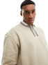 ASOS DESIGN heavyweight oversized polo sweatshirt with tipping in beige