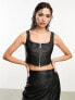 Фото #1 товара AllSaints x ASOS exclusive Odette faux leather zip through corset top in black