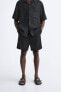 CREASED-EFFECT BERMUDA SHORTS