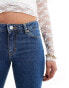 Фото #5 товара Monki Kikki comfort stretch low rise super flared jeans in blue wash