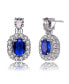 Sterling Silver White Gold Plated Sapphire Blue Oval Cubic Zirconia with Clear Pear and Round Cubic Zirconias Accent Earrings