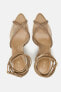 Lace-up vinyl sandals with rhinestones