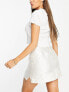 Фото #2 товара ASOS DESIGN daisy embroidered structured mini skirt in ivory