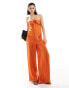 Фото #1 товара ASOS DESIGN halter tie ruched front straight leg satin jumpsuit in rust