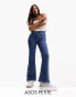 Фото #2 товара ASOS DESIGN Petite mid rise flare jeans in mid blue