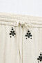 Embroidered wide-leg trousers