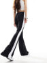 Фото #1 товара ASOS DESIGN contrast seam kick flare trouser in black