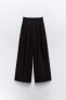 PLEATED TROUSERS