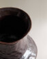 Irregular textured ceramic vase