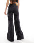 Фото #4 товара Levi's ribcage bells high rise flare jeans in black wash