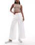 Фото #1 товара Labelrail x Olivia Grace Herring wide leg low rise textured trousers in white