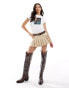 ASOS DESIGN baby tee with cowboy boots and legs photographic in white