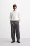 PLEATED CHINO TROUSERS