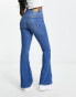 Фото #2 товара Bershka high waisted flared jeans in mid blue