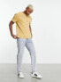 ASOS DESIGN relaxed t-shirt in washed yellow with cowgirl chest print