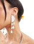 ASOS DESIGN drop earrings with white enamel detail in gold tone