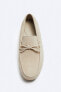 Split leather loafers with bow detail