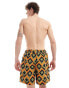 Hunky Trunks geo stripe swim shorts in green and orange