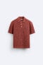 Textured openwork polo shirt