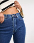 NA-KD high waist straight leg jeans in mid blue