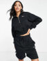 Nike mini swoosh quarter zip sweatshirt in black and sail