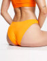 Weekday – Bikinihose in Orange mit hohem Beinausschnitt