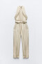 Jumpsuit with belt and beads