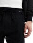 Another Influence cuffed cargo trousers in black