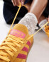 adidas Originals Handball Spezial trainers in yellow and pink with gum sole